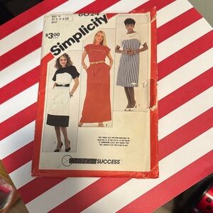Simplicity Women's Long Sleeve Dress Pattern in Black, White, and Red
